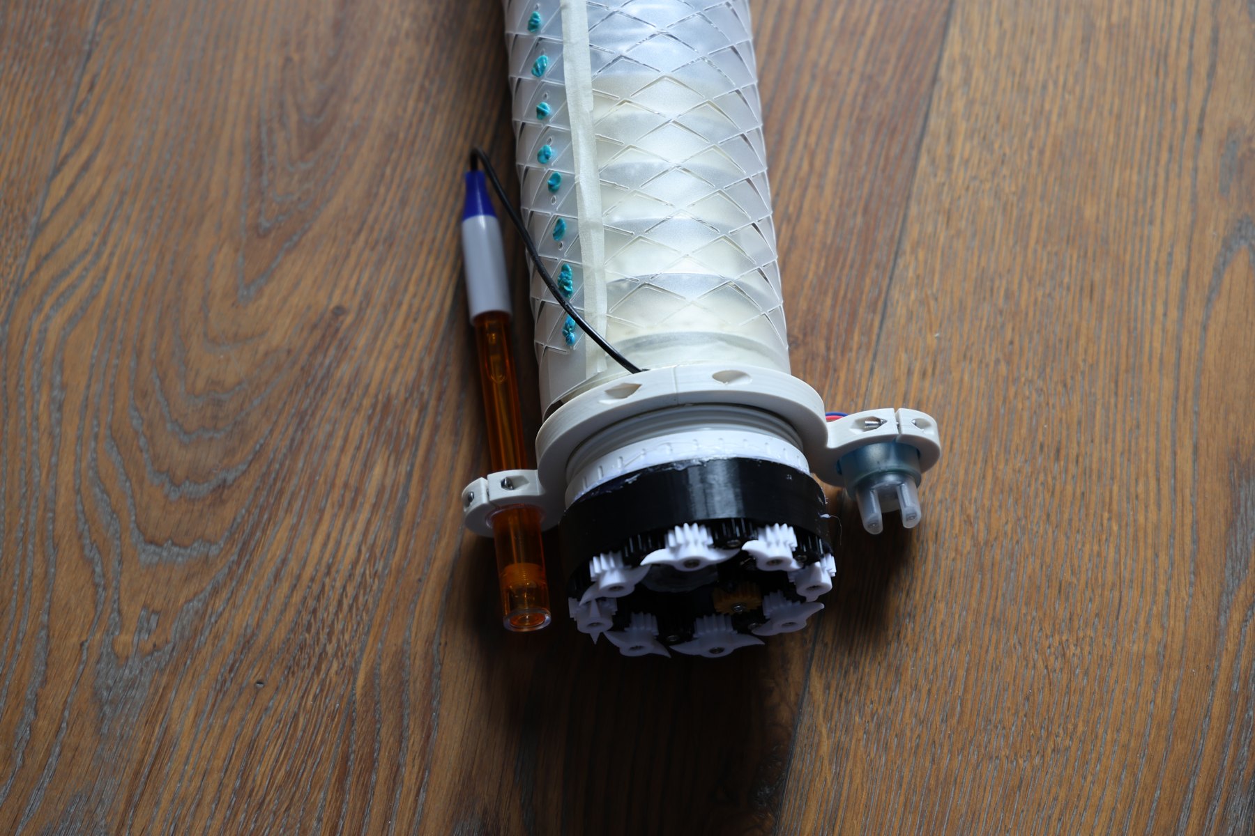 The completed robot showing its PET body, drive, and sensors.